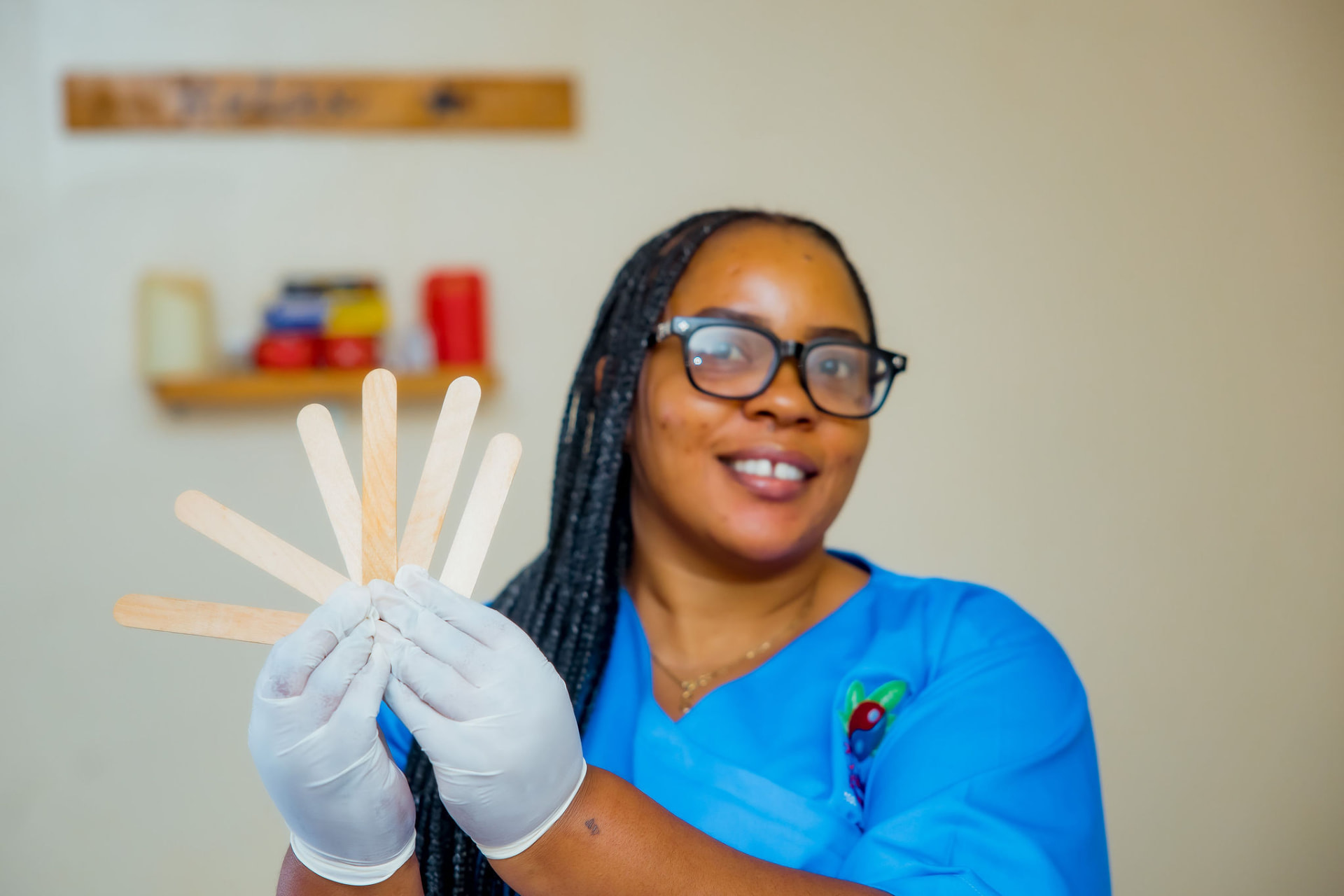 Oolala beauty therapist preparing waxing spatulas